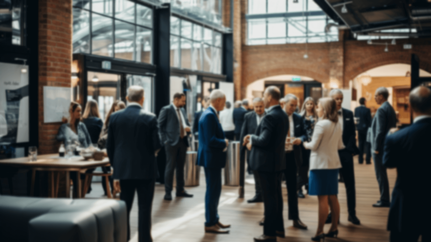 people talking at a conference event
