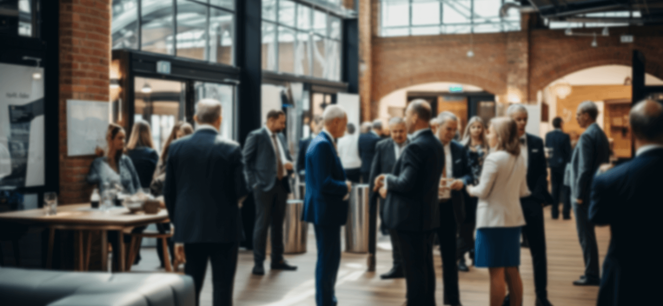 people talking at a conference event